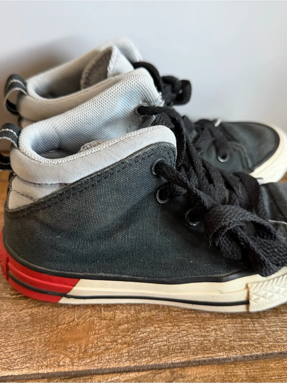 Converse Kids Black High-Top Canvas Sneakers with Gray Collar and Red Lace Tips